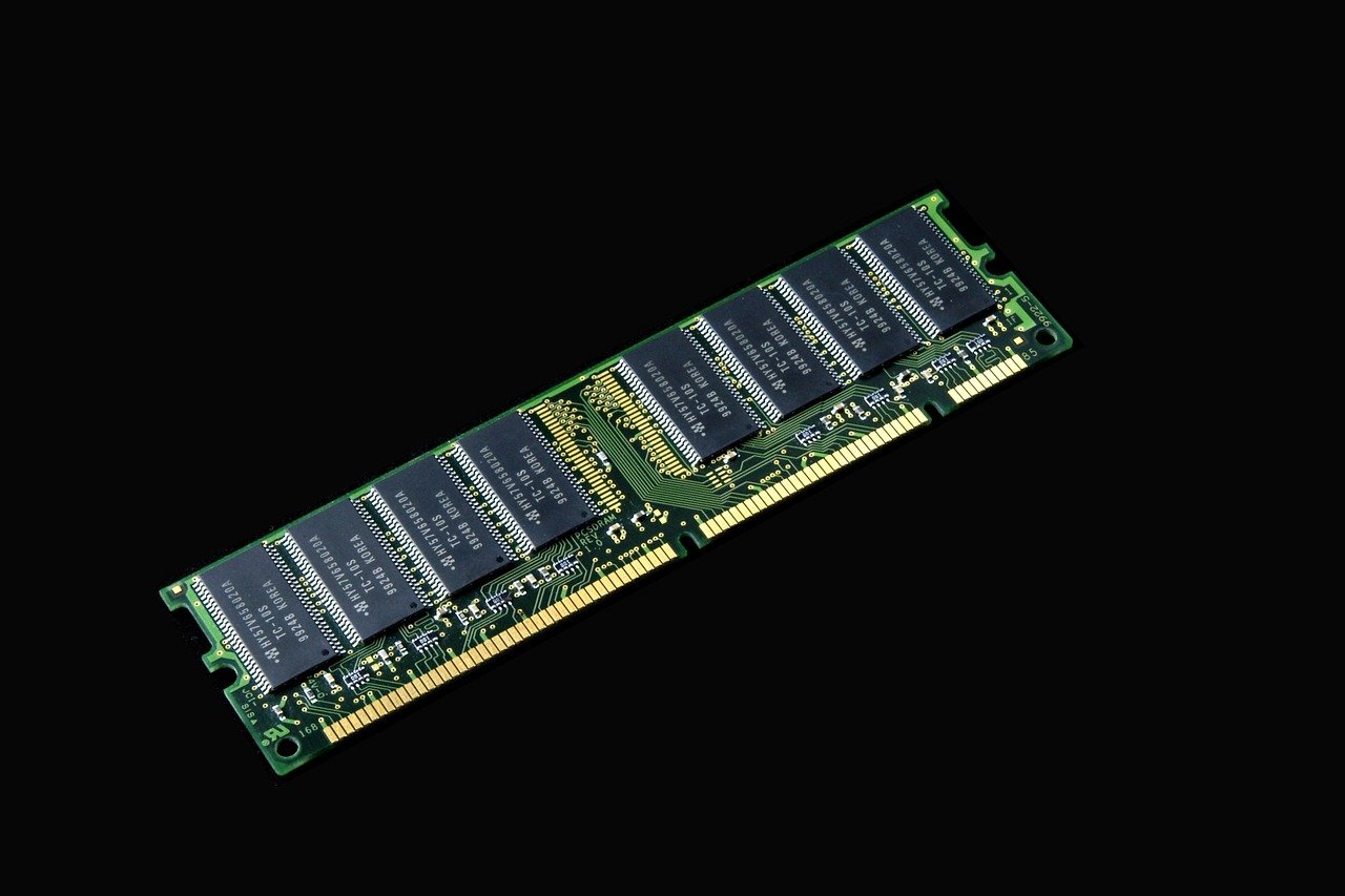 Several sticks of RAM lined up on a surface.